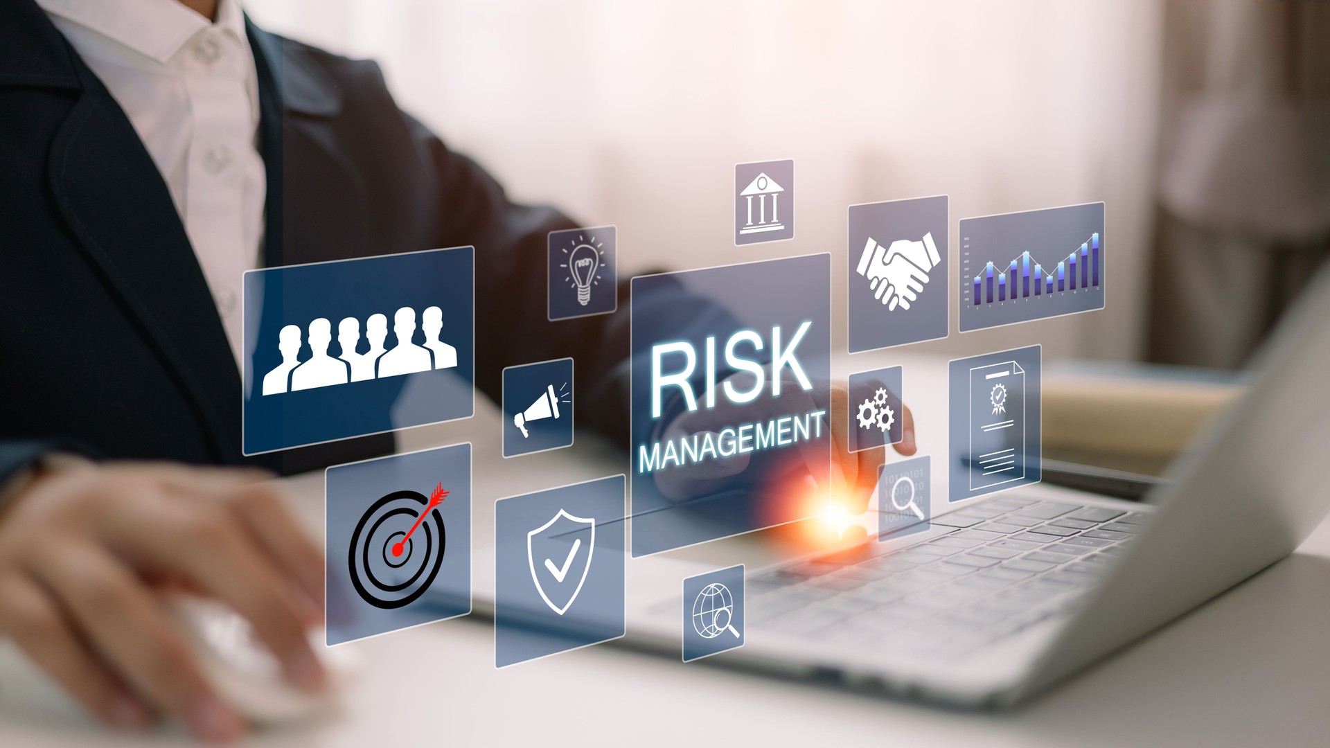 A businessman analyzes a virtual risk management interface with critical strategy icons on a laptop screen. Corporate risk management strategy concept. Analyze risk assessment, analysis financial,